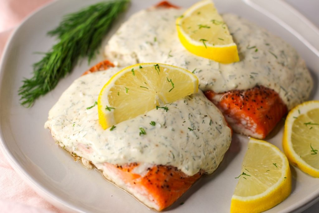 dill and yogurt salmon topped with lemon wheels