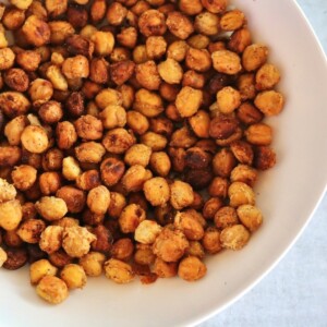 garlic roasted chickpeas in a white bowl