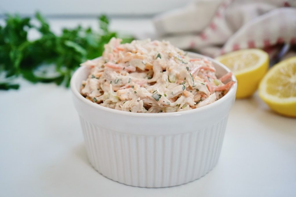 buffalo chicken salad in a white bowl