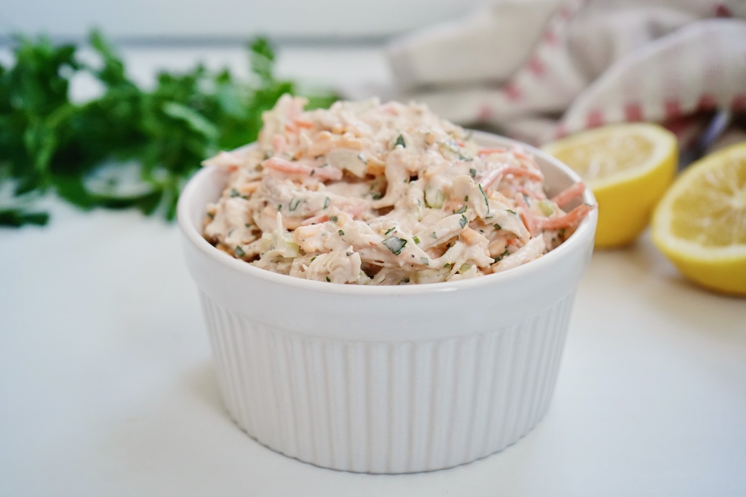 buffalo chicken salad in a white bowl