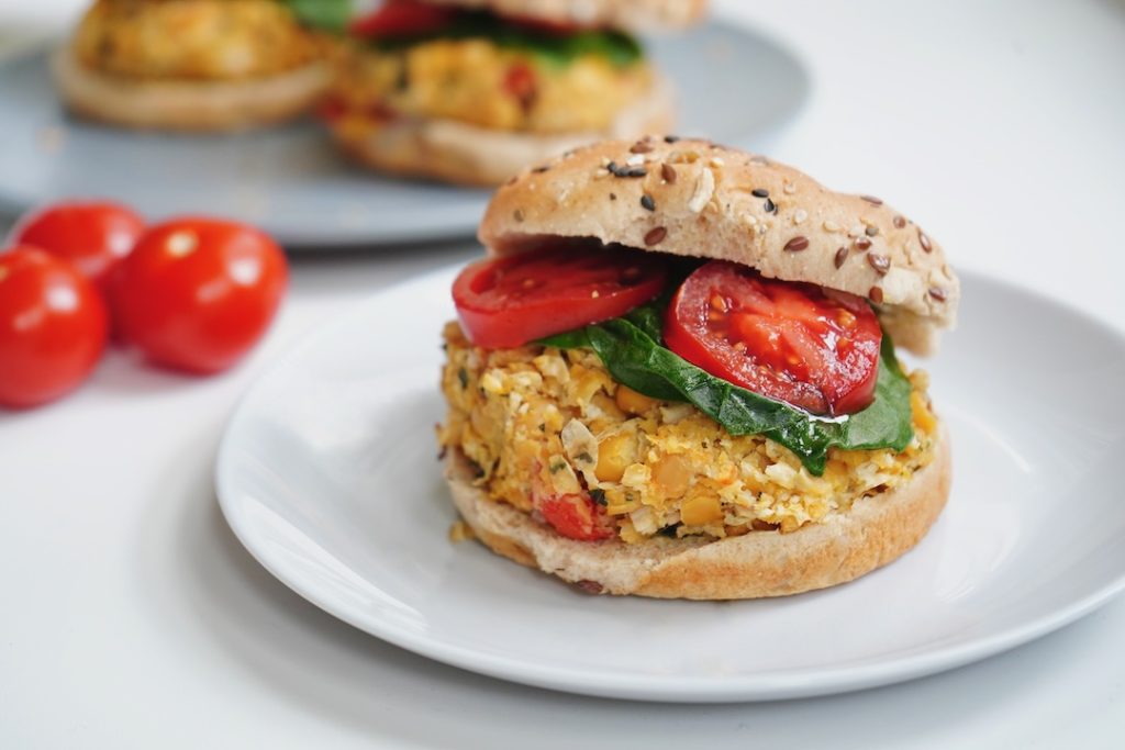 vegan chickpea burgers on a white plate