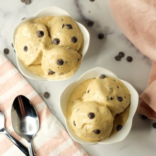 peanut butter nice cream in two bowls with two spoons