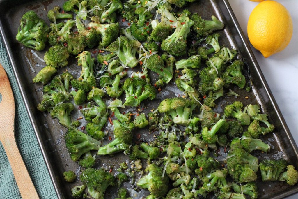 Lemon roasted broccoli on a sheet pan fresh from the oven